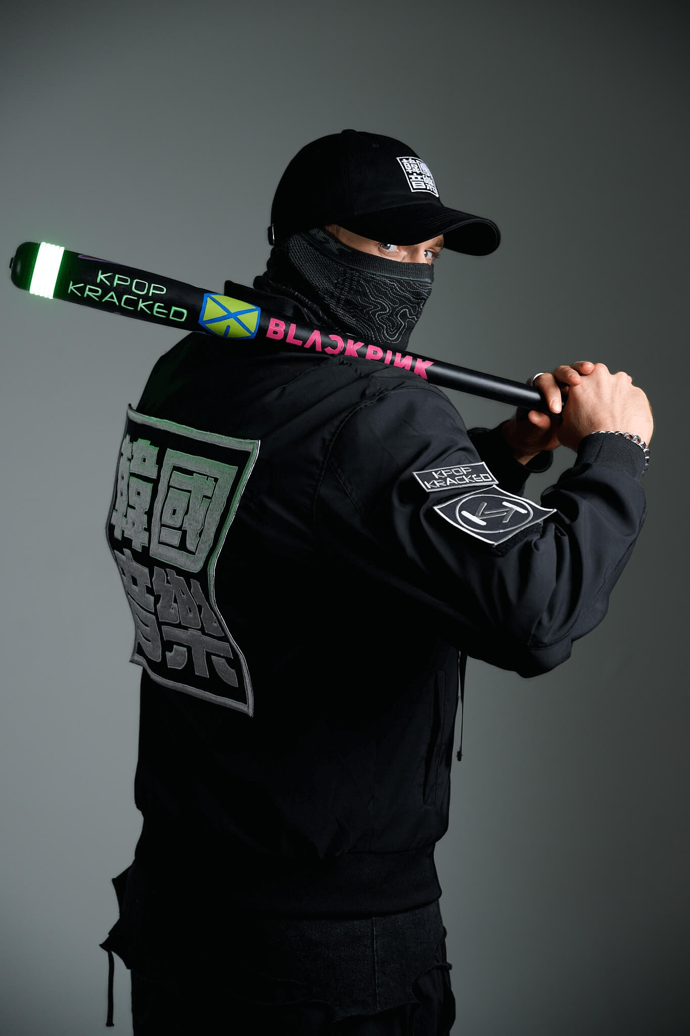 KPOP KRACKED posing with signature baseball bat